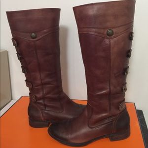 Cognac color knee high boots with back detail